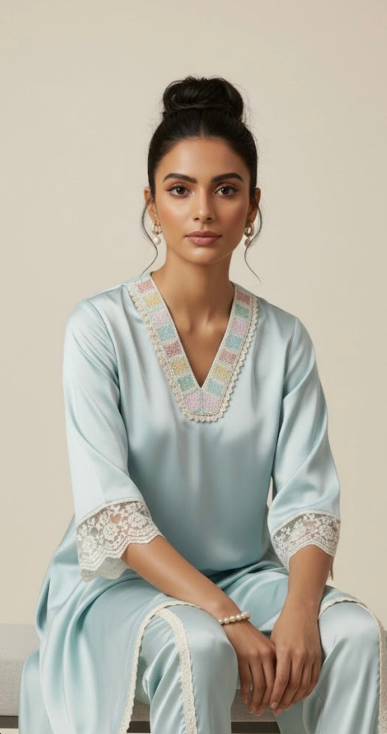 Sky Blue Satin Suit with Pearl Work on Neck and Laces on Sleeves with Tulip Pant